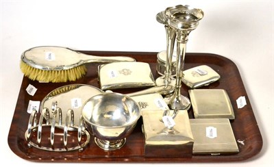 Lot 14 - A collection of miscellaneous silver wares including a Mappin & Webb toast rack, four cigarette...
