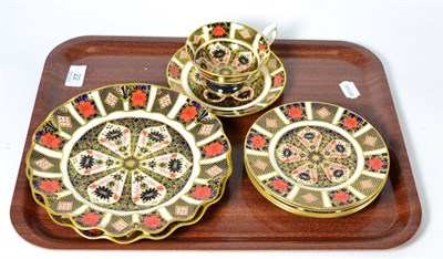 Lot 22 - A pair of Royal Crown Derby frilled plates, four tea plates, cup and saucer, all pattern 1128 (8)