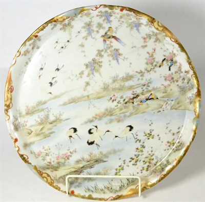Lot 28 - A Japanese porcelain charger, early 20th century, bird and foliate design, marks to reverse