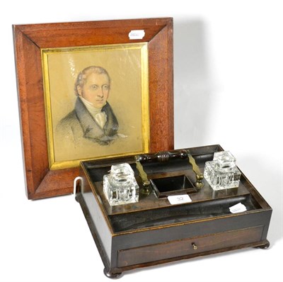 Lot 32 - A portrait of a gentleman and a mahogany inkstand