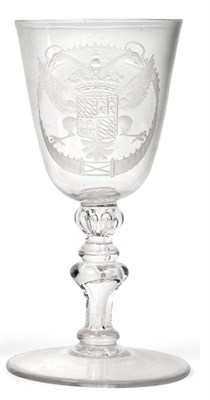 Lot 29 - A Large Armorial Wine Glass, circa 1780, the rounded funnel bowl engraved with arms of Delfland...