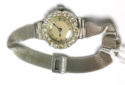Lot 66 - A 9ct white gold cocktail watch set with 20 diamonds to the bezel, total estimated diamond...