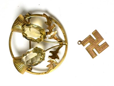 Lot 73 - A 9ct gold Scottish brooch and a charm