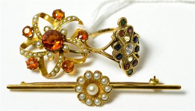 Lot 81 - A seed pearl bar brooch, a seed pearl and citrine swirl brooch and a dress ring (3)