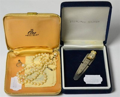 Lot 85 - A string of cultured pearls together with matching earrings, 9ct clasps by Ciro, cased;...