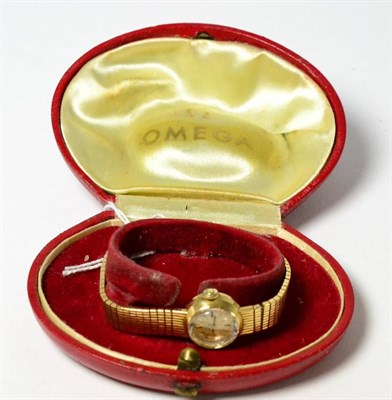 Lot 101 - A 9ct gold lady's wristwatch, signed Omega, with Omega box