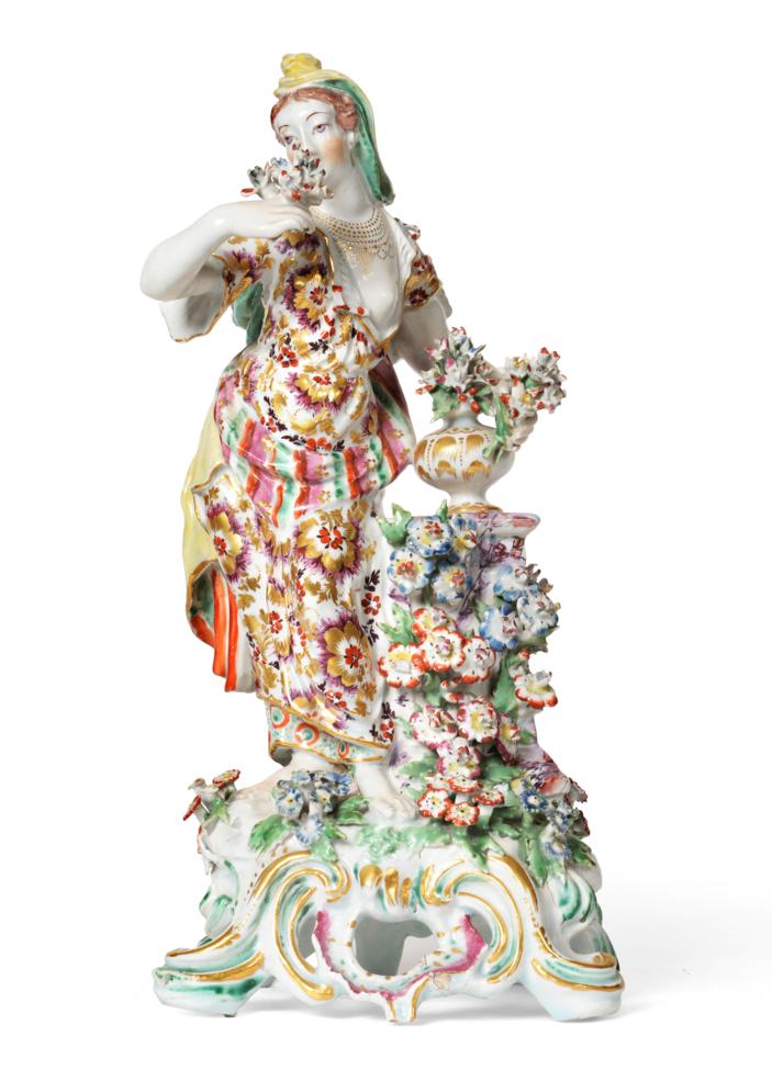 Lot 37 - A Bow Porcelain Figure of Flora, circa 1765, from a set of The Senses, the standing figure...