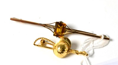 Lot 109 - A jockey's cap and whip brooch, stamped '750' and a stone set bar brooch, stamped '9ct'