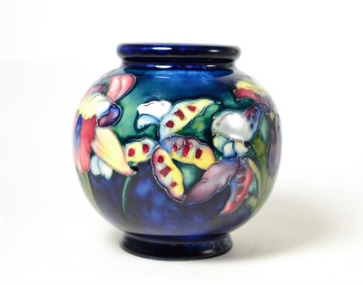 Lot 110 - A William/Walter Moorcroft Orchid and Spring flowers pattern vase, impressed factory marks and...