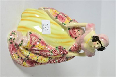 Lot 131 - A Goldscheider pottery figure of a young woman in a ballgown