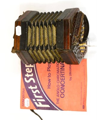 Lot 137 - A rosewood mounted English thirty key concertina, label marked Lachenal (part paper label worn)