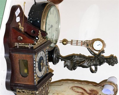 Lot 152 - A Dutch style wall clock, a spelter figural timepiece and a metal ship's type timepiece (3)