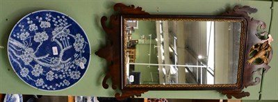 Lot 156 - A Georgian style mahogany and parcel gilt fret carved wall mirror and a Chinese blue and white...