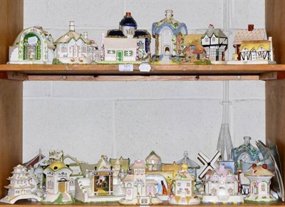 Lot 161 - Two shelves of Coalport cottages, a box of ceramic thimbles including Royal Worcester and an...