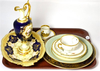 Lot 178 - Coalport blue and gilded ewer with a painted central scene, Coalport twin handled dish with a...