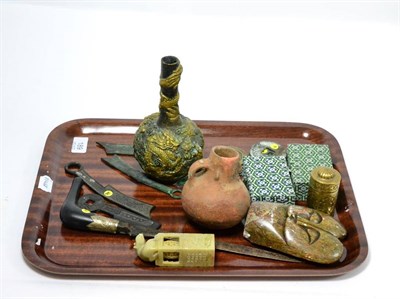 Lot 189 - A tray of Oriental collectors items, Chinese bronze mounts, Chinese coins, two snuff bottles, a...