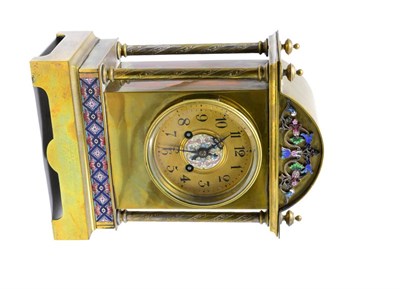 Lot 200 - A brass champleve enamel striking mantel clock