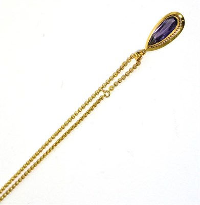 Lot 244 - A purple pendant on belcher chain, clasp stamped '375'