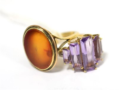 Lot 247 - A Cornelian ring and and amethyst five stone ring (2)