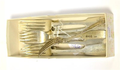 Lot 259 - Georgian silver dessert fork with shell mount and a pair of similar Victorian forks; three 1895...