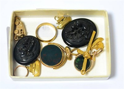 Lot 262 - Two bloodstone swivel fobs, three boat charms and a fire engine stamped '375', a 9ct gold...