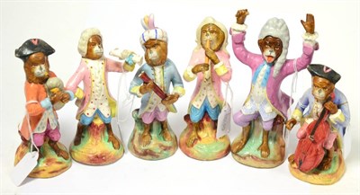 Lot 280 - A part set of six German monkey band or Affenkapelle figures, 20th century including conductor,...