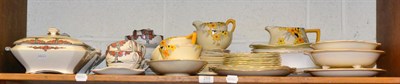 Lot 288 - Crown Ducal orange tree tureens, plates, cups, milk jug and sugar bowl and other Art Deco pottery