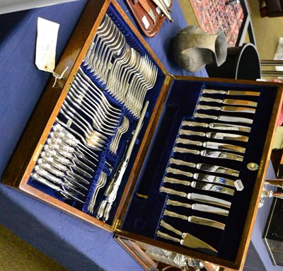 Lot 331 - An oak cased Mappin & Web plate canteen, eight settings including carving set and key