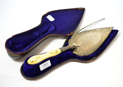 Lot 341 - A silver presentation trowel with ivory handle, dated 1876, in a fitted case