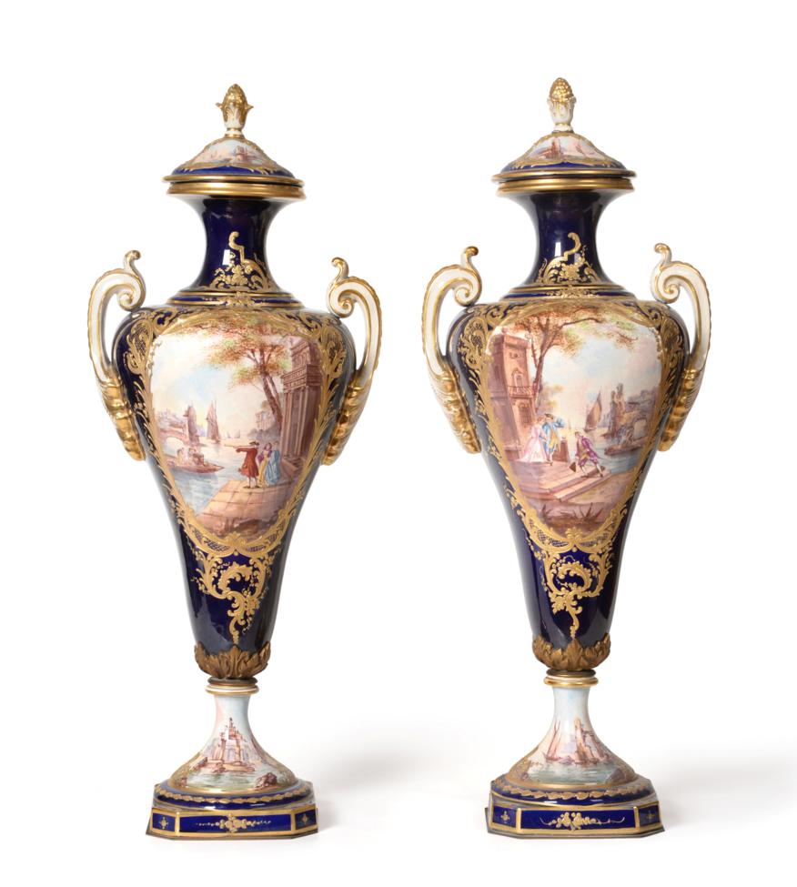 Lot 62 - A Pair of Sèvres Style Pottery Urn Shaped Vases and Covers, circa 1900, with pine cone finials and