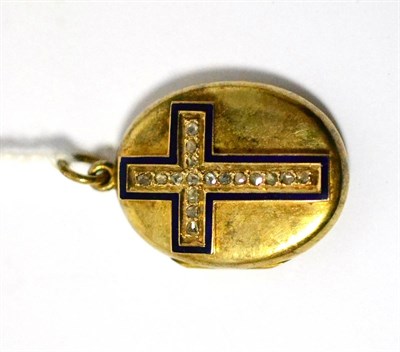 Lot 349 - A Victorian yellow metal oval hair locket with applied diamond set enamel cross