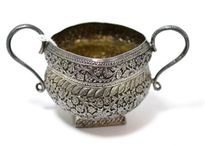 Lot 365 - A Burmese silver sugar bowl with fine floral chasing