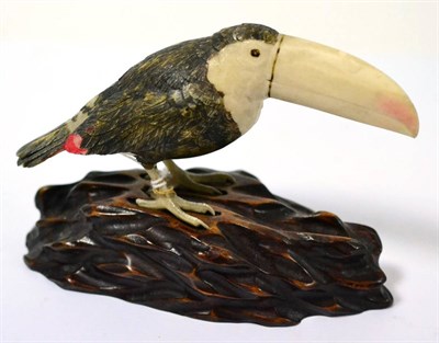 Lot 366 - A Japanese ivory model of a toucan, polychrome painted, late 19th/early 20th Century in date