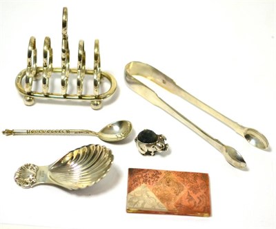 Lot 369 - Small Victorian silver pin cushion in the form of a pig, a silver shell form caddy spoon,...