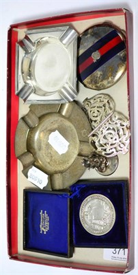 Lot 371 - A British dairy farmers association founded 1876 silver medal in a fitted case, a ";Punch"; figural