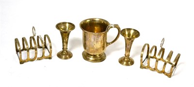 Lot 387 - Pair of silver toast racks, silver Christening mug and pair of small spill vases (a.f.) (5)