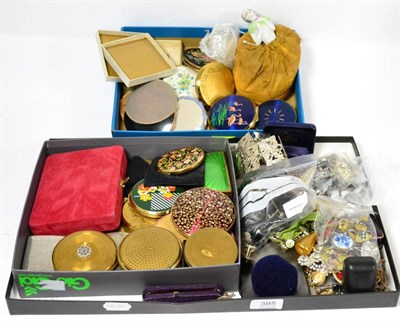 Lot 395 - A quantity of costume jewellery consisting of brooches, beads, plated belt, jet jewellery, compacts