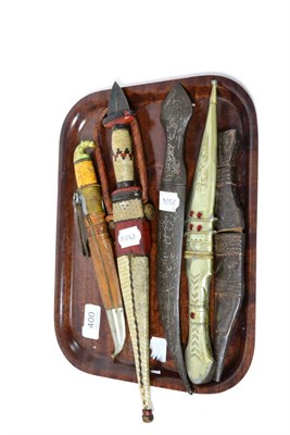 Lot 400 - Persian white metal inlaid steel dagger, North African dagger, Finnish knife and two others