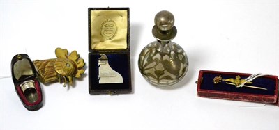 Lot 414 - A white metal thimble, brass vesta case as a cockerel, a silver rudder, a white metal mounted...