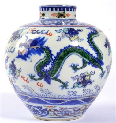 Lot 74 - A Chinese Wucai Porcelain Jar, of ovoid form with short cylindrical neck, painted with dragons...