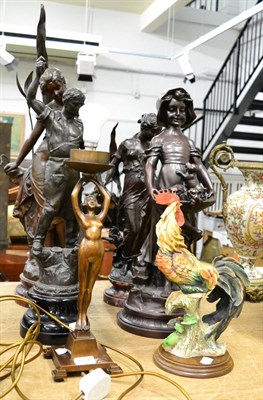 Lot 1016 - Three spelter figures, Art Deco style figural table lamp, resin figure of a girl and a resin...