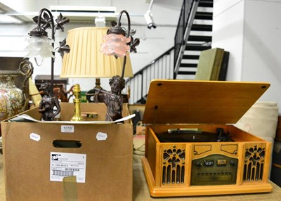 Lot 1018 - A Victorian cased carving set, six modern table lamps and a music turn table