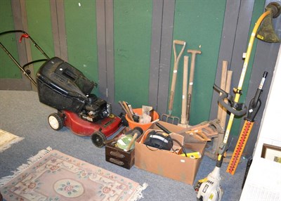 Lot 1044 - Quantity of gardening tools including a lawn mower and strimmer