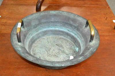 Lot 1097 - A bronze Chinese spouting fountain bowl