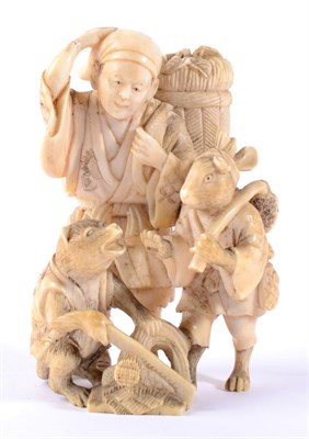 Lot 92 - A Japanese Ivory Okimono, Meiji period, carved with a scene from Kachi-Kachi Yama, signed...