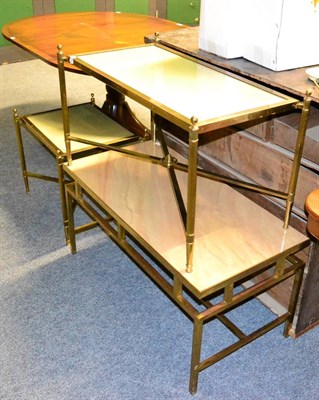 Lot 1116 - Three gilt metal marble and onyx topped coffee tables together with a small leather inset drum...