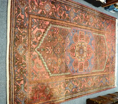 Lot 1157 - Kurdish rug, West Iran, the lozenge field with central octagon enclosed by samovar motif...