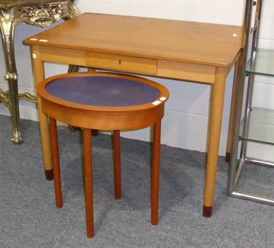 Lot 1162 - A mid 20th century writing table together with a small tray top table, probably Italian