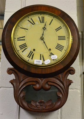 Lot 1165 - A striking drop dial wall clock, scroll decorated trunk