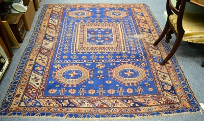 Lot 1166 - A Bergama rug, West Anatolia, the mid indigo field with central panel enclosed by polychrome...